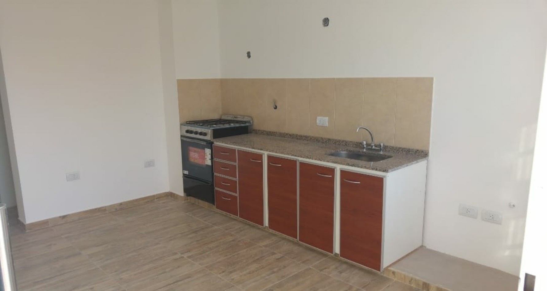 DEPARTAMENTO 2 AMBIENTES CON COCHERA